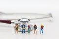 Miniature people: Travelers with pre-departure health check-ups. Image use for healthy , travel concept