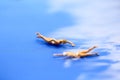 Miniature people: Vacationers are enjoy to swimming.