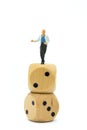 Miniature people : Women standing on dice. Image use for to solve problems, risk management , business concept