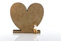 Miniature people: Worker brush painting Wooden Heart. Art of bus Royalty Free Stock Photo