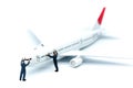 Miniature people : worker or Housewife cleaning on air plane us