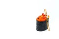 Miniature people : worker with Salmon egg on sushi nigiri roll o Royalty Free Stock Photo