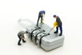 Miniature people, worker and security key using as background security system, hack, business concept Royalty Free Stock Photo