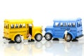 Miniature people: Workers brush painting school bus,Back to school concept.