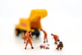 Miniature people : Workers are cleaning, area for construction work. Use images for construction business Royalty Free Stock Photo
