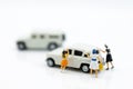 Miniature people : Workers make up the car. Image use for cleaning and maintenance, business autocar concept.