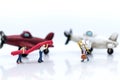 Miniature people: Workers prepare equipment for maintenance of t