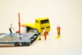 Miniature people: Workers pulling a pallet truck with circuit board moving for sent to repair