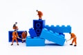 Miniature people : Workers are repairing, arranging components for construction work. Use images for construction business