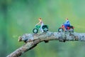 Miniature person figure of a rider motor cycle in the park / toys kids
