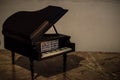 Miniature of Piano with papers of music