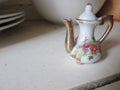 Miniature Porcelain Tea Pot. Royalty Free Stock Photo