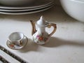 Miniature Porcelain Tea Set. Royalty Free Stock Photo