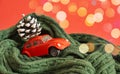 miniature purple retro car model, christmas background