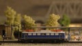 Miniature railway carriage. Royalty Free Stock Photo