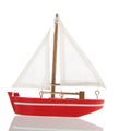 Miniature red sail boat Royalty Free Stock Photo