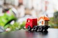 Miniature red trailer delivery mini house using as logistics, pr
