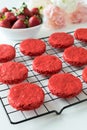 Miniature Red Velvet Cakes with cream cheese frosting and fresh strawberry topping Royalty Free Stock Photo