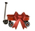 Miniature red Wagon with Glittery Christmas Bow Royalty Free Stock Photo