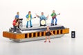 Miniature of a rock band playing on the harmonica Royalty Free Stock Photo