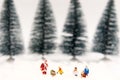 Miniature Santa Claus with Snow man make happy hour for children on Christmas day,