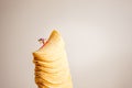 Miniature skier sliding down the stack of potato chips Royalty Free Stock Photo