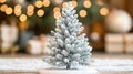 Miniature Snow Covered Christmas Tree On Wooden Surface Royalty Free Stock Photo