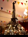 The miniature statuette of the Eiffel tower with blurred focus