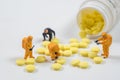 Miniature technical team are monitoring contaminants in drugs pi Royalty Free Stock Photo