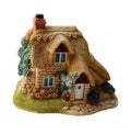 Miniature thatched cottage home in quaint english village