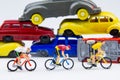 Miniature tiny toys cyclist ride bicycle in The abandoned car ce