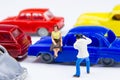 Miniature tiny toys photographer take photos woman sitting on ca