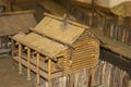 miniature toy house in the garden. Wooden houses in the village handmade housework