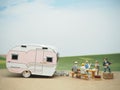 Miniature toy of people at table with blurred background. Vacation concept design. Royalty Free Stock Photo