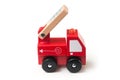 Miniature toy, wooden fire truck on white background Royalty Free Stock Photo