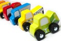 Miniature Toys Alignment Colorful Wooden Cars And Trucks On White Background