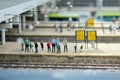 Miniature train station with passengers at Madurodam miniature park, The Hague, Netherlands
