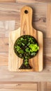 Miniature Tree Planted on Wooden Cutting Board Royalty Free Stock Photo