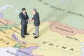 Miniature two businessman shakehand on china map Royalty Free Stock Photo