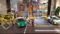 Miniature of vehicles and people depicting a hong Kong street