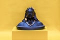 Miniature version of Adiyogi Shiva idol sitting on yellow box