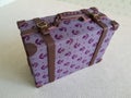 Miniature vintage suitcase for dolls Royalty Free Stock Photo