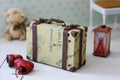 Miniature vintage suitcase for dolls Royalty Free Stock Photo