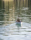 Miniature Voyage: Model Boat On A Gentle Journey