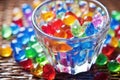 miniature water balloons in a glass bowl