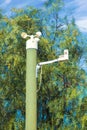 Miniature weather station on top of a pole Royalty Free Stock Photo