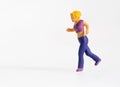 Miniature woman in colorful sportswear out jogging