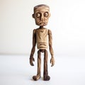 Wooden Toy Frankenstein Figure: Linear Surrealism With Evil Grin