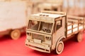 miniature wooden mechanical truck on the table