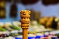 Miniature wooden replica of Ashoka Stambha. An ancient historic indian monument.Lion face Pliiar of Ashoka, Indian national emblem Royalty Free Stock Photo